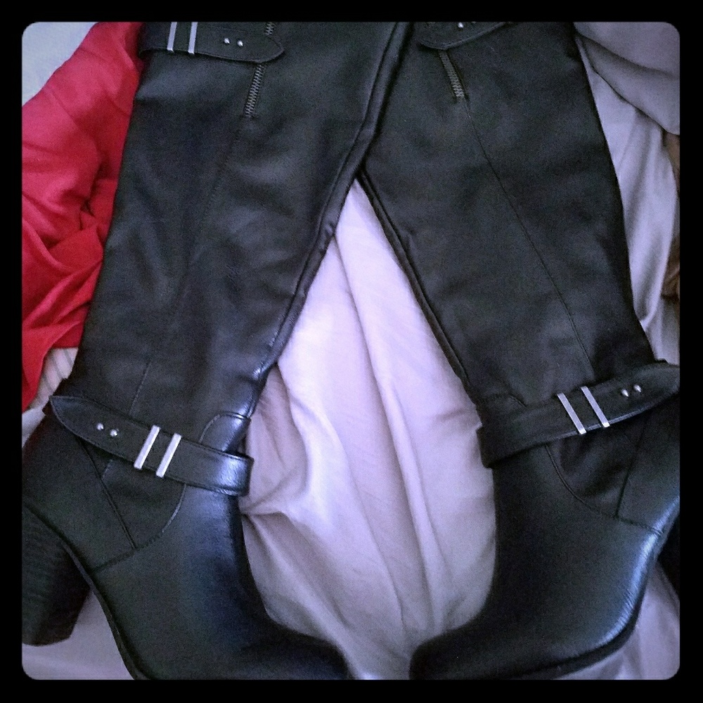Black heel boots mid calf.